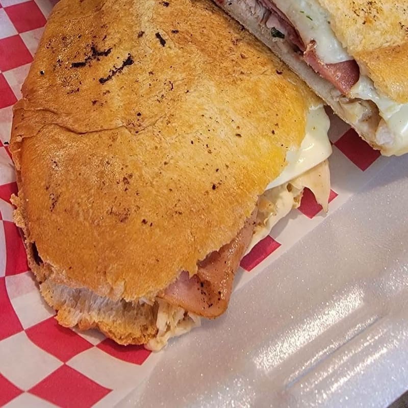 Heavenly Chicken sandwich, pressed and sliced in half